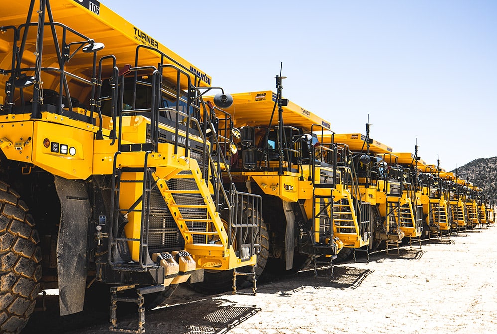 A row of mining loaders at a quarry