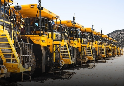 A row of mining loaders at a quarry
